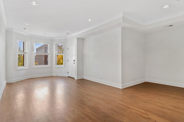 1116 W Addison St, Chicago, IL 60613 - unfurnished room featuring wood finished floors, ornamental molding, and recessed lighting