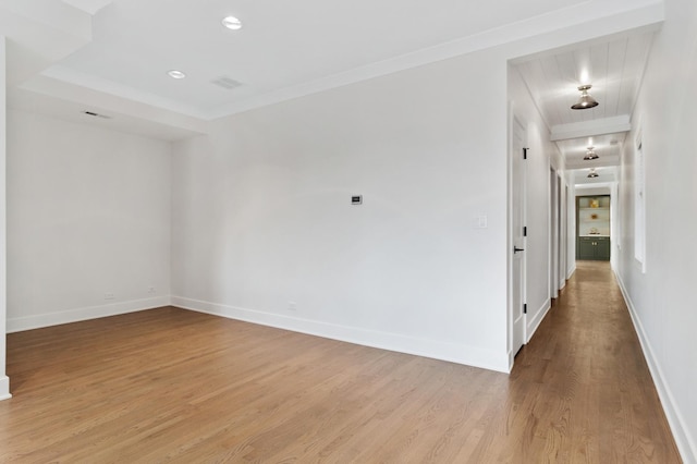 1116 W Addison St, Chicago, IL 60613 - spare room with light wood finished floors, crown molding, and recessed lighting
