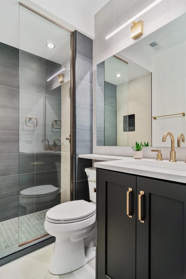 1116 W Addison St, Chicago, IL 60613 - bathroom featuring a shower stall, tile walls, vanity, and tile patterned floors
