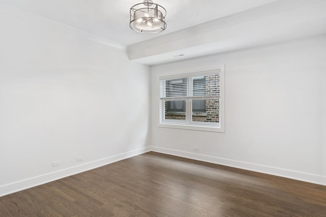 1116 W Addison St, Chicago, IL 60613 - spare room with a chandelier, dark wood-type flooring, and ornamental molding