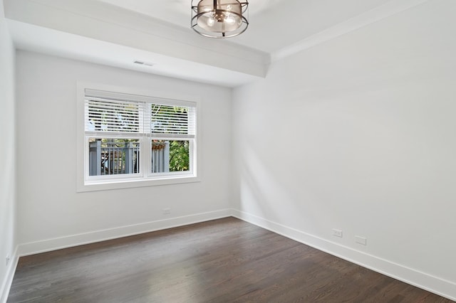 1116 W Addison St, Chicago, IL 60613 - spare room with a chandelier and dark wood-type flooring