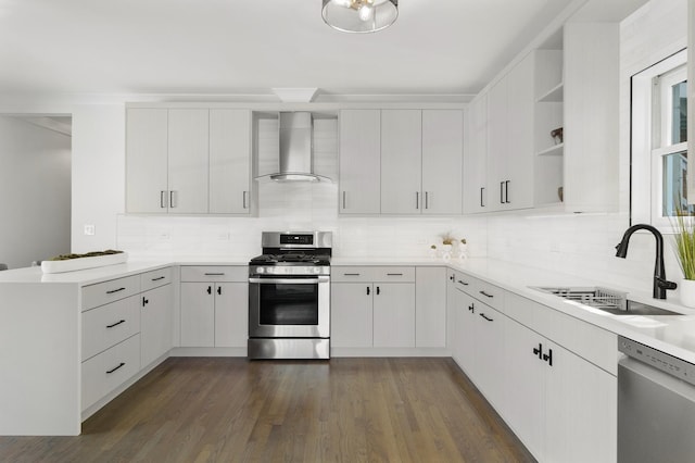 1116 W Addison St, Chicago, IL 60613 - kitchen featuring stainless steel appliances, wall chimney range hood, a peninsula, open shelves, and decorative backsplash
