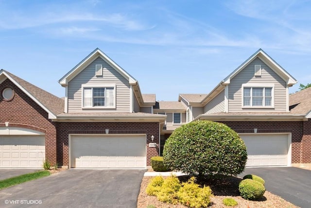 13350 Forest Ridge Dr Unit 1, Palos Heights, IL 60463 - traditional-style house featuring brick siding, a garage, driveway, and roof with shingles