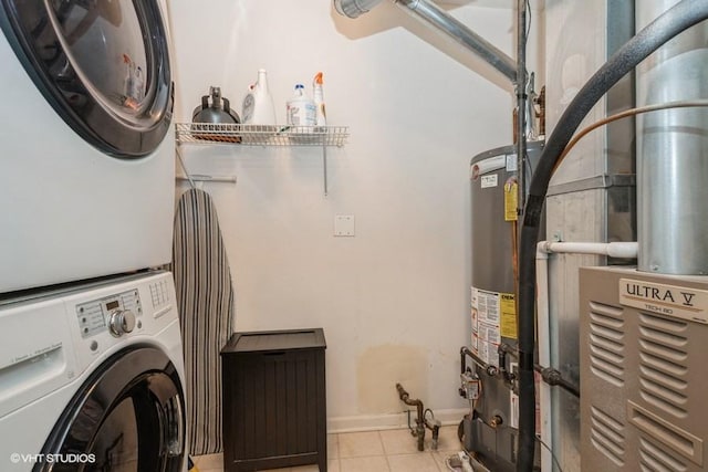 13350 Forest Ridge Dr Unit 1, Palos Heights, IL 60463 - washroom with stacked washer / drying machine, tile patterned floors, and gas water heater