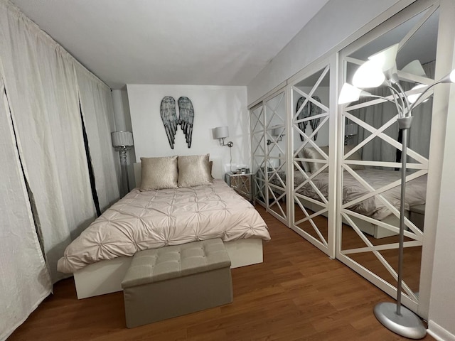 230 E Ontario St Unit 905, Chicago, IL 60611 - bedroom featuring wood finished floors