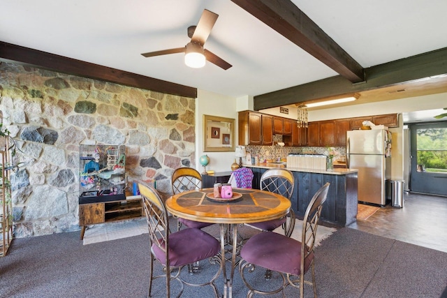 15810 Il Route 173 Unit 1D, Harvard, IL 60033 - dining space featuring ceiling fan and beamed ceiling
