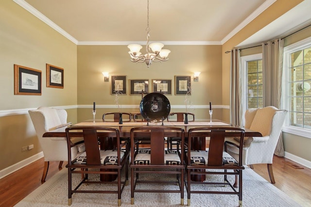 13 Wind Ridge Rd, South Barrington, IL 60010 - dining room featuring a chandelier, wood finished floors, and ornamental molding