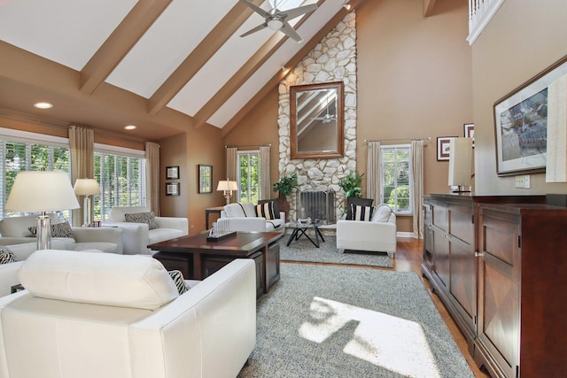 13 Wind Ridge Rd, South Barrington, IL 60010 - living area featuring high vaulted ceiling, a fireplace, a ceiling fan, plenty of natural light, and wood finished floors