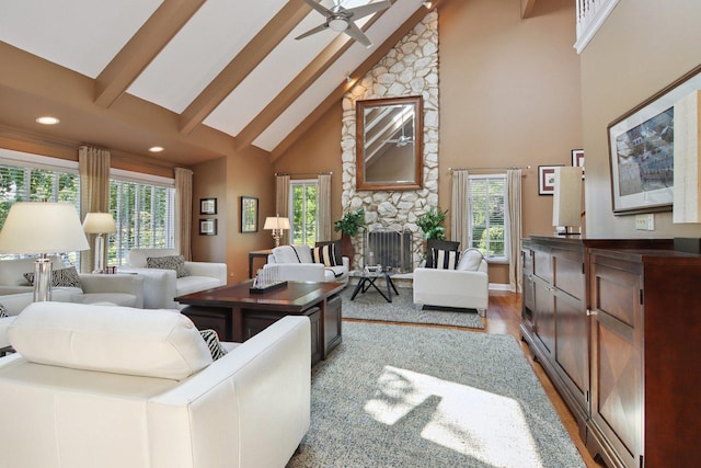 13 Wind Ridge Rd, South Barrington, IL 60010 - living area with high vaulted ceiling, plenty of natural light, a ceiling fan, wood finished floors, and beamed ceiling