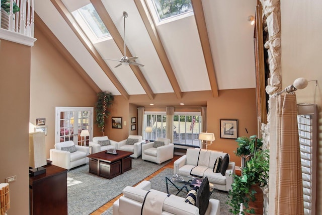 13 Wind Ridge Rd, South Barrington, IL 60010 - living area with a skylight, wood finished floors, high vaulted ceiling, beam ceiling, and a ceiling fan