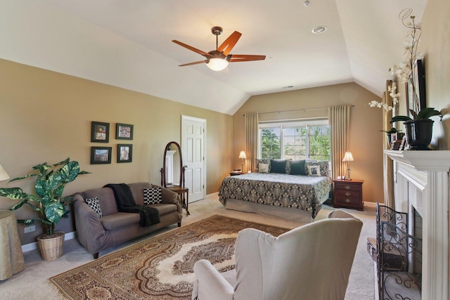 13 Wind Ridge Rd, South Barrington, IL 60010 - bedroom with light colored carpet, vaulted ceiling, a fireplace, and a ceiling fan