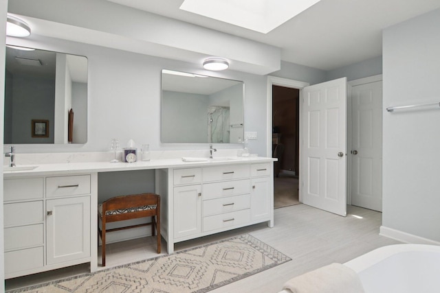 13 Wind Ridge Rd, South Barrington, IL 60010 - bathroom featuring double vanity, a skylight, a bath, and a shower