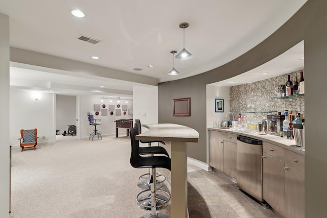 13 Wind Ridge Rd, South Barrington, IL 60010 - indoor wet bar with stainless steel dishwasher, recessed lighting, decorative backsplash, hanging light fixtures, and light colored carpet