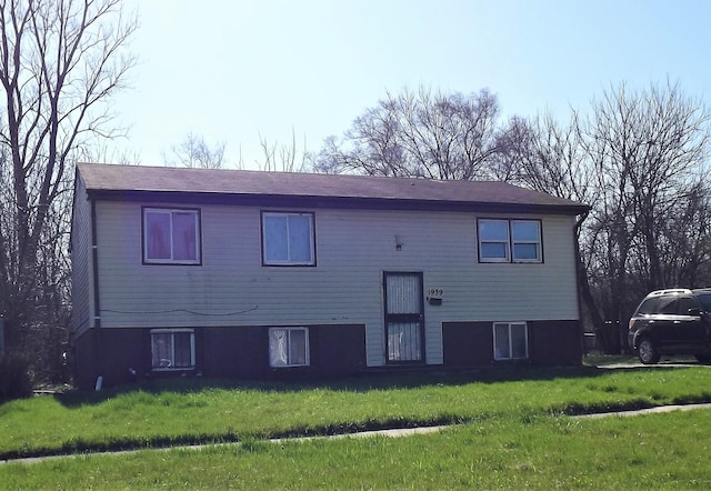 1939 Ashland Ave, Chicago Heights, IL 60411 - rear view of house featuring a lawn