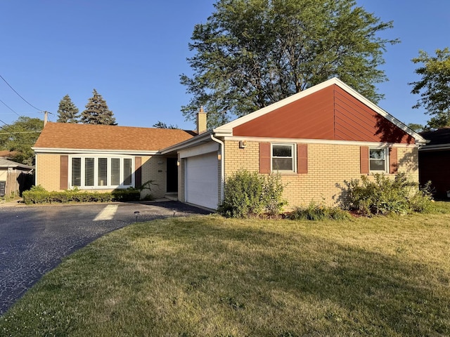16850 School St, South Holland, IL 60473 - ranch-style house featuring driveway, a garage, a chimney, brick siding, and a front yard