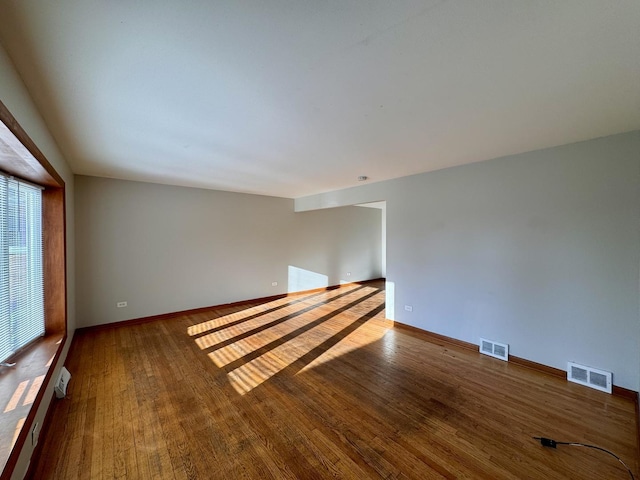 16850 School St, South Holland, IL 60473 - unfurnished room with wood finished floors and baseboards