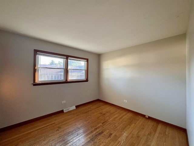 16850 School St, South Holland, IL 60473 - unfurnished room with light wood-type flooring and baseboards