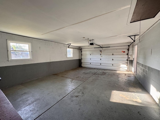 16850 School St, South Holland, IL 60473 - garage with a garage door opener and concrete block wall