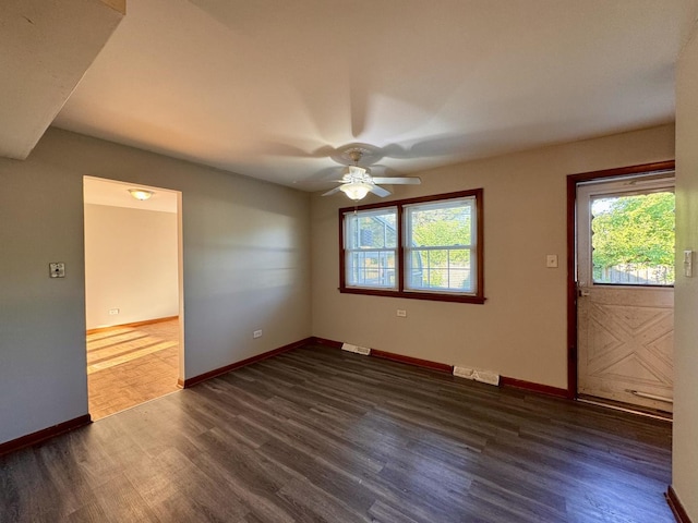 16850 School St, South Holland, IL 60473 - spare room with dark wood-style flooring and ceiling fan
