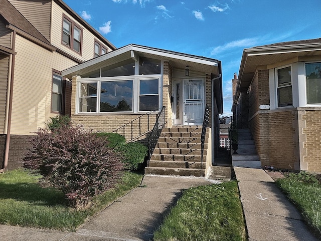 1747 E 92nd Pl, Chicago, IL 60617 - property entrance with brick siding