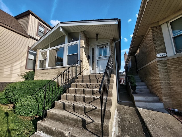 1747 E 92nd Pl, Chicago, IL 60617 - entrance to property featuring brick siding