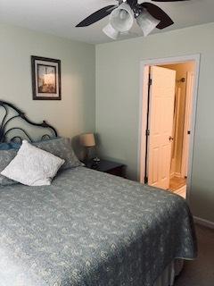 1463 Carlisle Ln, Hampshire, IL 60140 - carpeted bedroom with a ceiling fan