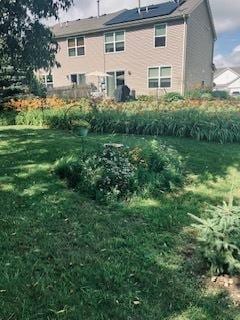 1463 Carlisle Ln, Hampshire, IL 60140 - back of house featuring a yard