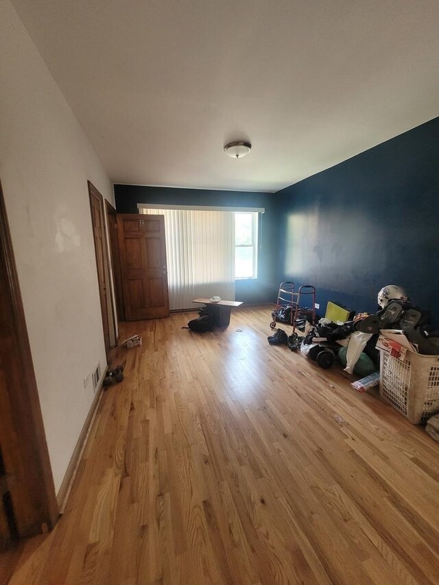 8344 S Mackinaw Ave, Chicago, IL 60617 - unfurnished room featuring wood finished floors