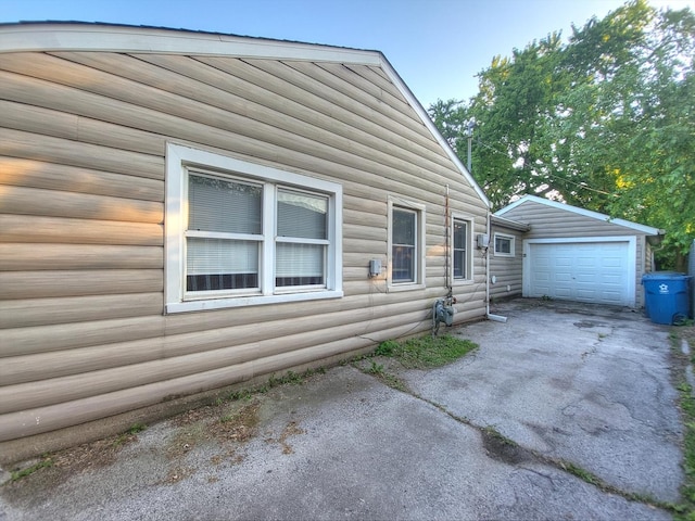 14610 Sawyer Ave, Midlothian, IL 60445 - view of property exterior with a garage and driveway