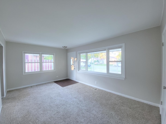 14610 Sawyer Ave, Midlothian, IL 60445 - unfurnished room with healthy amount of natural light and carpet