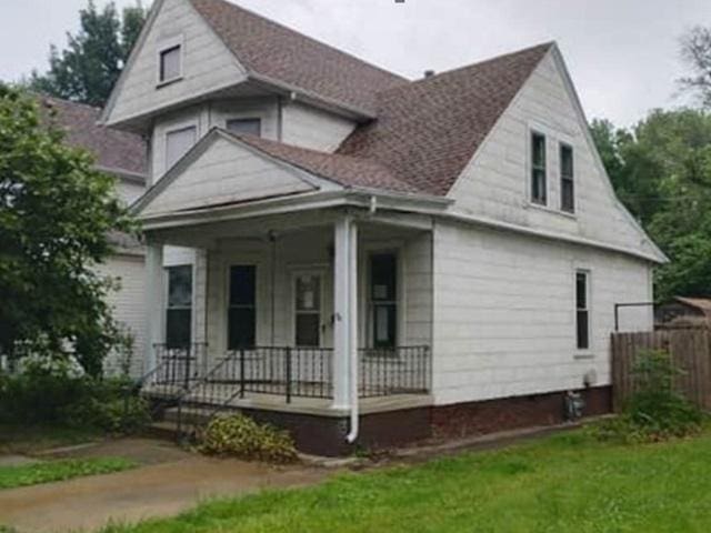 1022 N 3rd St, Springfield, IL 62702 - view of side of property featuring a porch