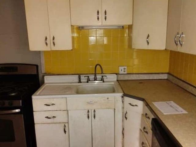1022 N 3rd St, Springfield, IL 62702 - kitchen featuring stainless steel gas stove, white cabinets, tasteful backsplash, and dishwasher