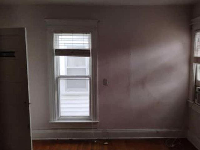 1022 N 3rd St, Springfield, IL 62702 - empty room with wood finished floors
