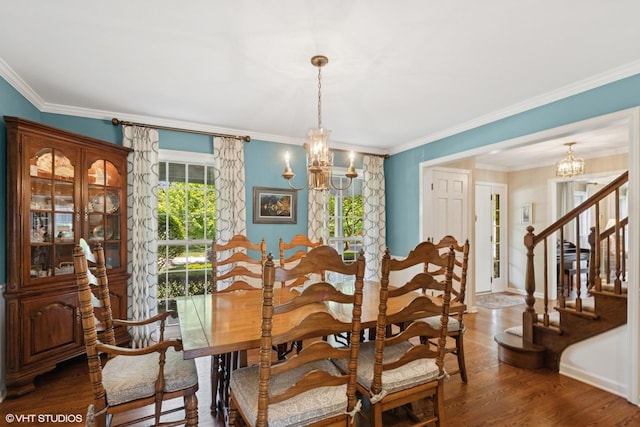 375 Sunset Dr, Northfield, IL 60093 - dining room with a chandelier, wood finished floors, stairway, and crown molding