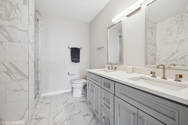 645 N Kingsbury St Unit 2002, Chicago, IL 60654 - bathroom with marble look tile flooring, double vanity, and a marble finish shower