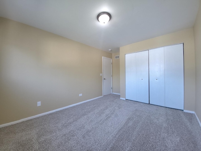 913 Dartmouth Ave, Matteson, IL 60443 - unfurnished bedroom featuring carpet flooring and a closet