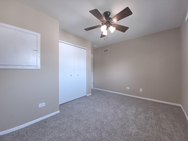 913 Dartmouth Ave, Matteson, IL 60443 - unfurnished bedroom featuring carpet floors, a closet, and a ceiling fan