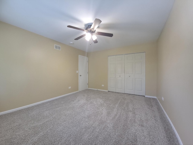 913 Dartmouth Ave, Matteson, IL 60443 - unfurnished bedroom featuring carpet flooring, ceiling fan, and a closet