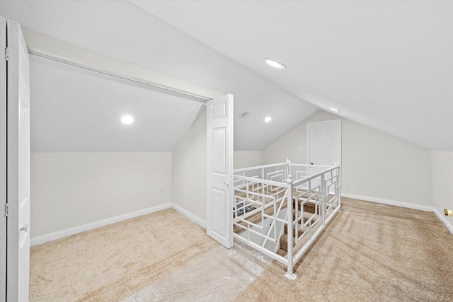 8214 S Paxton Ave, Chicago, IL 60617 - additional living space featuring carpet, vaulted ceiling, and recessed lighting