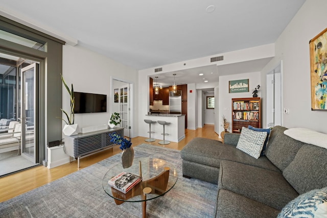 60 E Monroe St Unit 2606, Chicago, IL 60603 - living room with light wood finished floors