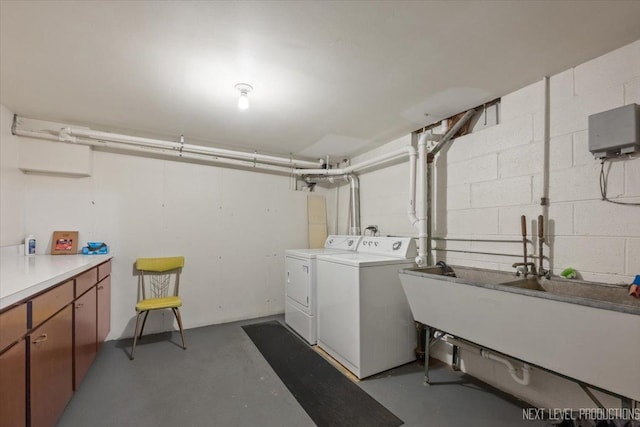 208 Kenston Ct Unit 208, Geneva, IL 60134 - laundry area with washing machine and clothes dryer, cabinet space, and concrete block wall