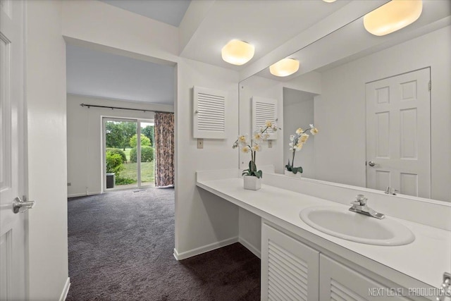 208 Kenston Ct Unit 208, Geneva, IL 60134 - bathroom featuring baseboards and vanity