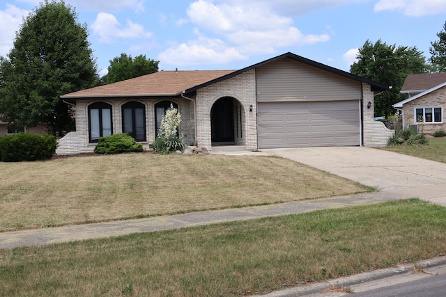 8818 Lori Ln, Orland Park, IL 60462 - view of front of property with brick siding, a garage, concrete driveway, and a front yard