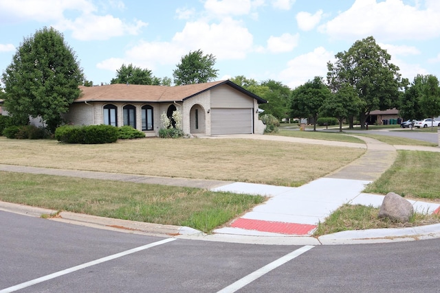 8818 Lori Ln, Orland Park, IL 60462 - ranch-style home with an attached garage, a front yard, brick siding, and driveway