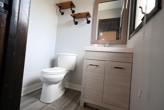 8818 Lori Ln, Orland Park, IL 60462 - half bath featuring vanity and wood finished floors