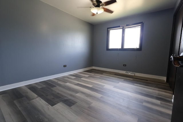 8818 Lori Ln, Orland Park, IL 60462 - empty room featuring ceiling fan and dark wood-style floors