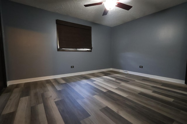 8818 Lori Ln, Orland Park, IL 60462 - empty room featuring a textured ceiling, a ceiling fan, and dark wood-style floors