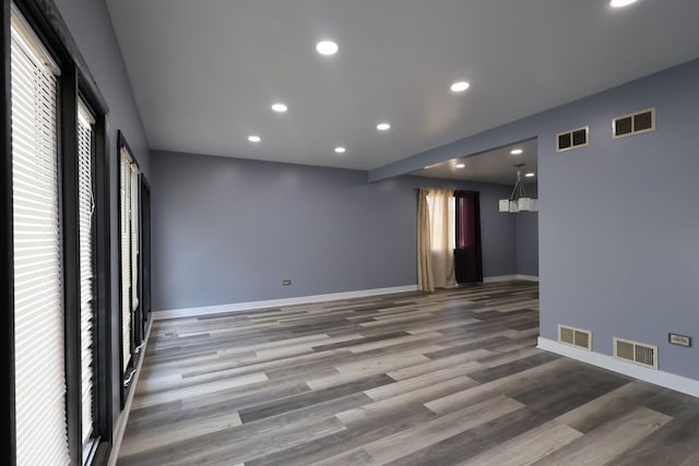 8818 Lori Ln, Orland Park, IL 60462 - empty room featuring recessed lighting and wood finished floors