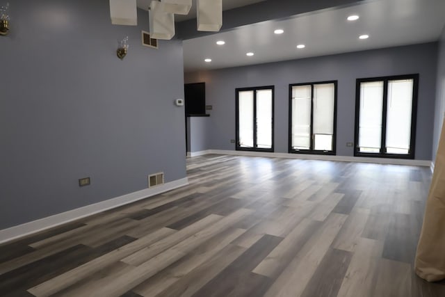 8818 Lori Ln, Orland Park, IL 60462 - spare room featuring recessed lighting and wood finished floors