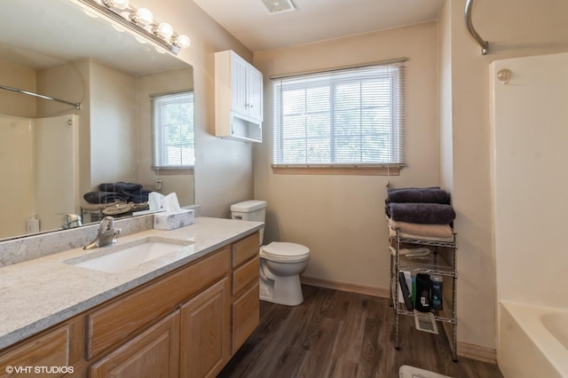 25637 S Fieldstone Ct, Channahon, IL 60410 - full bathroom featuring vanity and wood finished floors